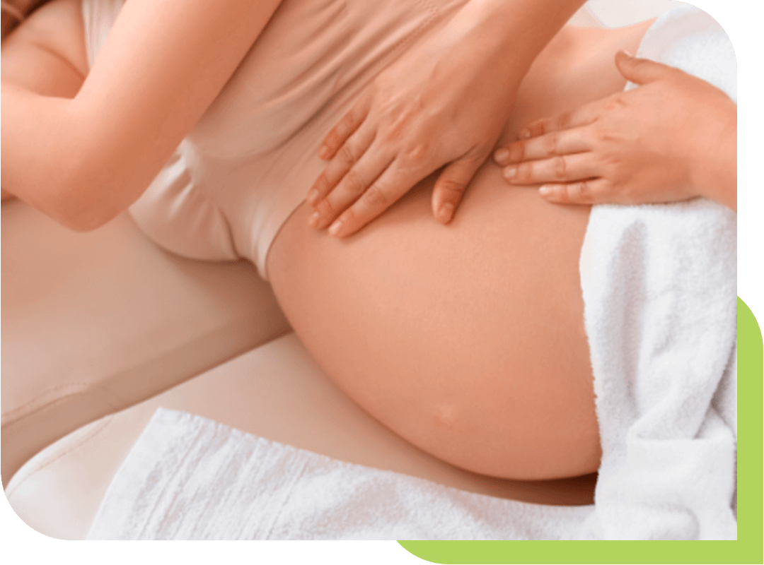 image of a prenatal massage. postpartum massage can help eliminate fluid build up